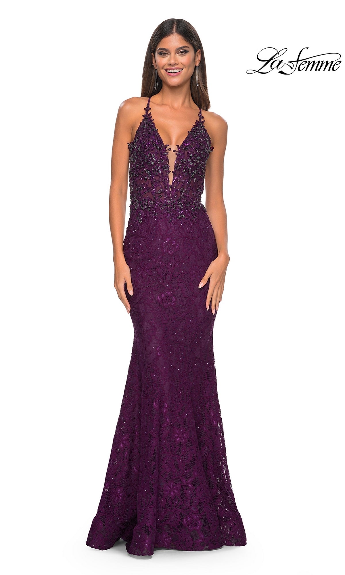 A woman wears the La Femme Beaded-Lace Long Prom Dress 31265 in deep purple, featuring a sleeveless beaded lace design, fitted bodice, plunging neckline, and floor-length skirt. The La Femme logo appears in the top right corner.